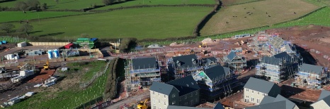 an image of a housing construction site in rural countryside